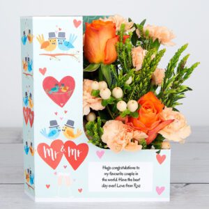 Mr & Mrs’ Flowercard with Downtown Roses, Peach Spray Carnations, Hypericum Berries, Platyspermum and Fresh Eucalyptus